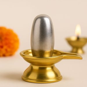 Pure Parad Shivling on brass yoni base with diya and marigold – Divine Samagri