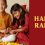 Sister tying rakhi on her younger brother’s wrist with “Happy Rakhi” message in yellow text